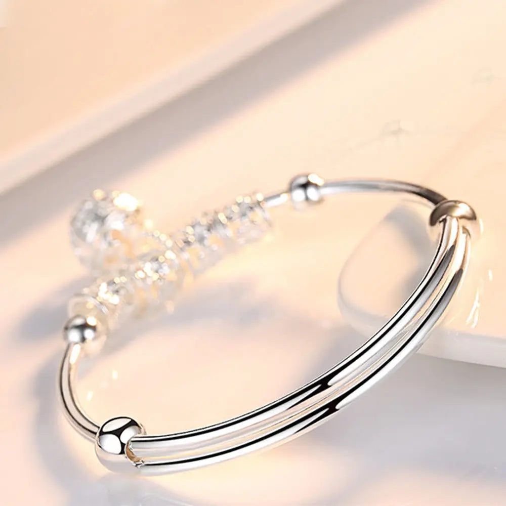 ELEGANT HOLLOW BELL SILVER BANGLE BRACELET