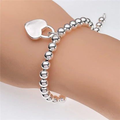 Elegant 925 Sterling Silver Charm Bracelet with Polished Geometric Design