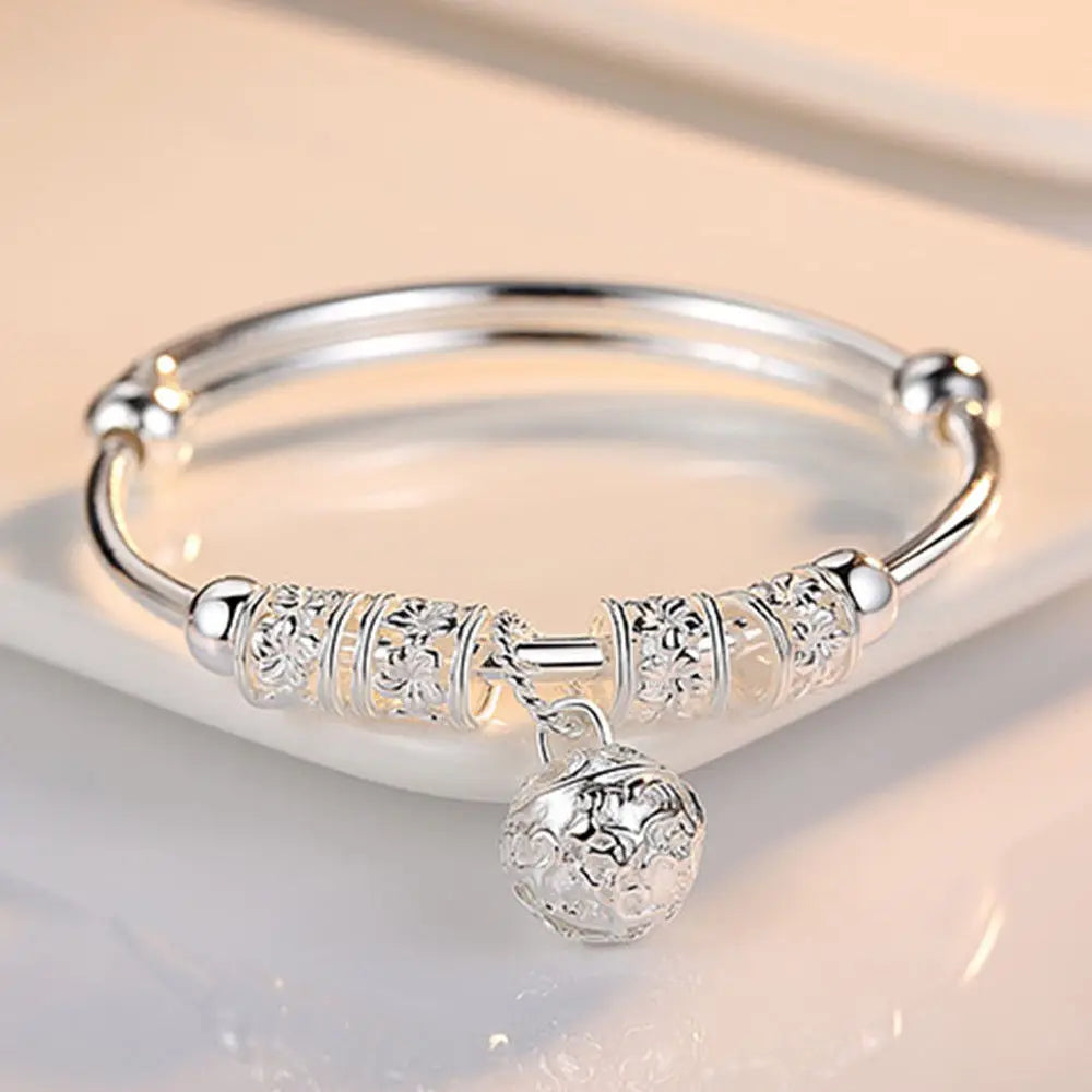 ELEGANT HOLLOW BELL SILVER BANGLE BRACELET