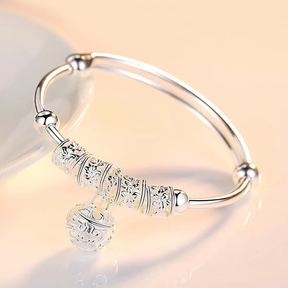ELEGANT HOLLOW BELL SILVER BANGLE BRACELET