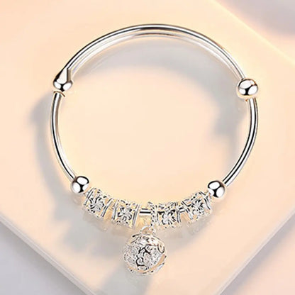 ELEGANT HOLLOW BELL SILVER BANGLE BRACELET